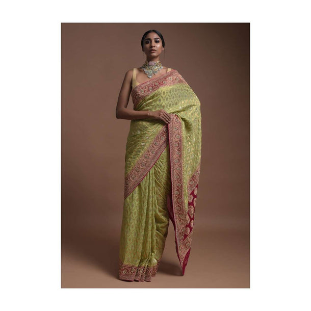 Spring Green Banarsi Saree In Georgette With Weaved Floral Mesh And Floral Motifs On The Rani Pink Pallu Online - Kalki Fashion