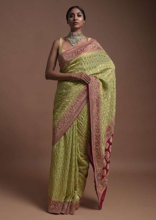 Spring Green Banarsi Saree In Georgette With Weaved Floral Mesh And Floral Motifs On The Rani Pink Pallu Online - Kalki Fashion