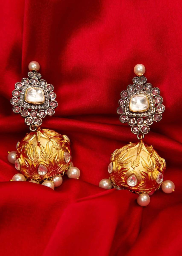 Stone studded earring with golden jhumkas drop