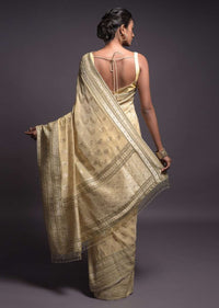 Sugar Cookie Beige Banarasi Saree In Georgette With Weaved Floral Buttis Online - Kalki Fashion