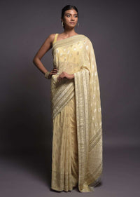 Sugar Cookie Beige Banarasi Saree In Georgette With Weaved Floral Buttis Online - Kalki Fashion