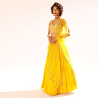 Sun Yellow Gathered Lehenga With Hand Embroidered Blouse Using Sequins And Cut Dana In Floral Motifs