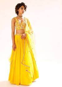 Sun Yellow Gathered Lehenga With Hand Embroidered Blouse Using Sequins And Cut Dana In Floral Motifs