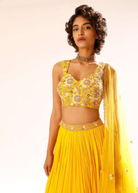 Sun Yellow Gathered Lehenga With Hand Embroidered Blouse Using Sequins And Cut Dana In Floral Motifs