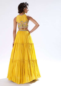 Sun Yellow Lehenga In Crushed Georgette With Halter Neck Crop Top Adorned In Colorful Resham And Cut Dana Work