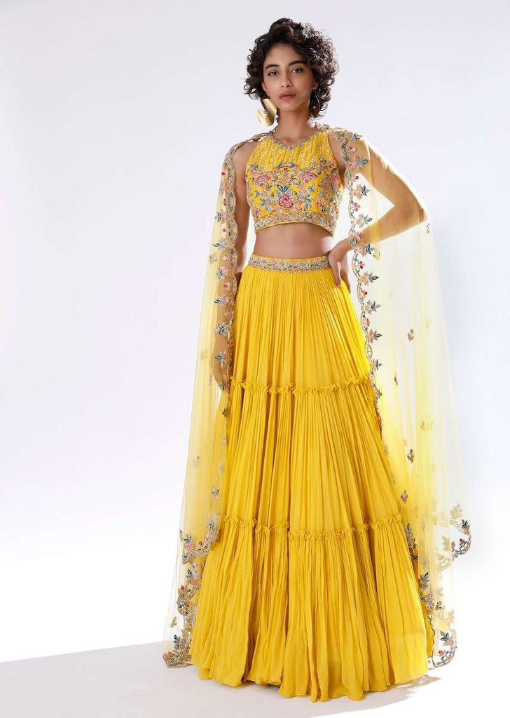 Sun Yellow Lehenga In Crushed Georgette With Halter Neck Crop Top Adorned In Colorful Resham And Cut Dana Work