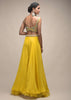 Sun Yellow Palazzo Suit With 3D Organza Flower Embellished Crop Top And Short Cape