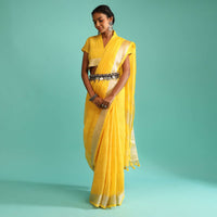 Sun Yellow Saree In Linen With Silver Brocade Border And Striped Pallu Along With A Matching Unstitched Blouse