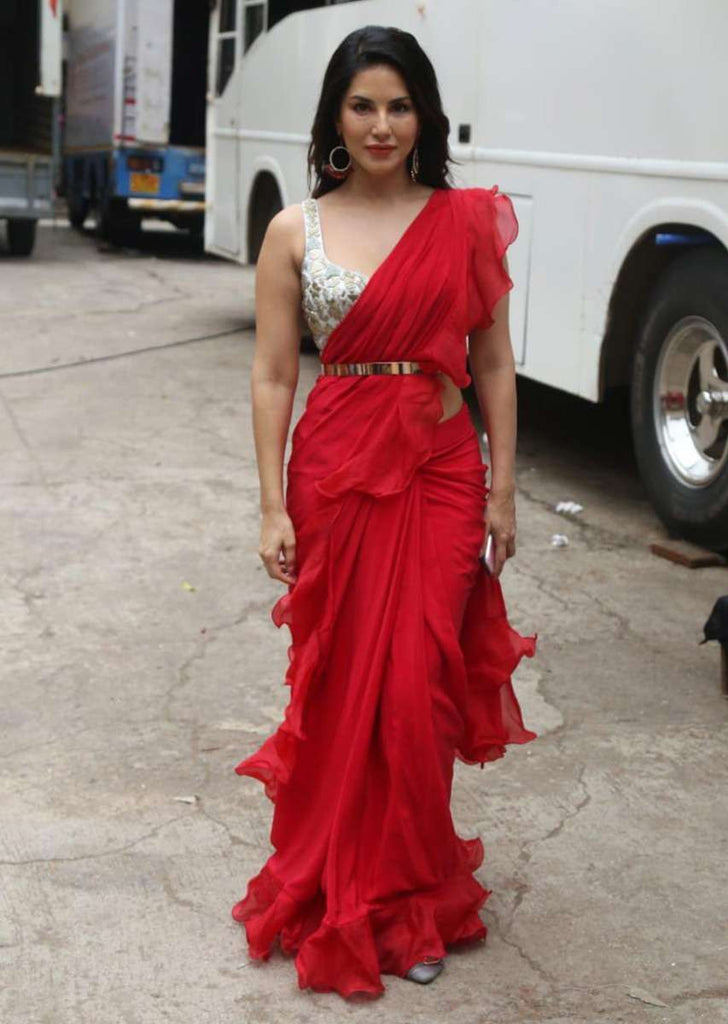 Sunny Leone In Kalki Scarlet Red Ruffle Saree And Embellished Silver Crop Top