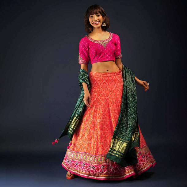 Tangerine Orange Lehenga In Bandhani Printed Silk With Rani Pink Choli And Green Bandhani Dupatta