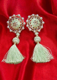 Tasseled cluster earing adorn with pearls and kundan work only on kalki