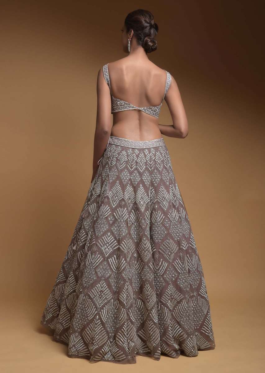 Taupe Grey Lehenga Choli In Net Elaborately Hand Embellished With Cut Dana Work In Geometric Pattern