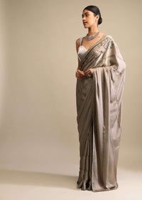 Taupe Saree In Satin With Kunan Embellished Stripes And Unstitched Blouse Online - Kalki Fashion