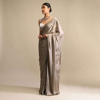 Taupe Saree In Satin With Kunan Embellished Stripes And Unstitched Blouse Online - Kalki Fashion