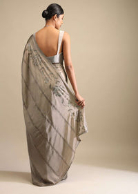 Taupe Saree In Satin With Kunan Embellished Stripes And Unstitched Blouse Online - Kalki Fashion