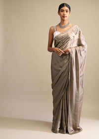 Taupe Saree In Satin With Kunan Embellished Stripes And Unstitched Blouse Online - Kalki Fashion