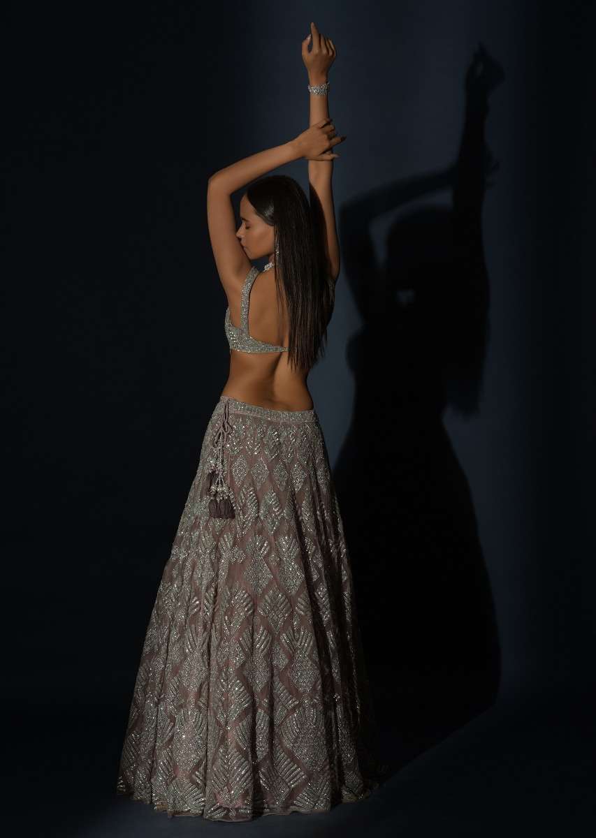 Taupe Grey Lehenga Choli In Net Elaborately Hand Embellished With Cut Dana Work In Geometric Pattern