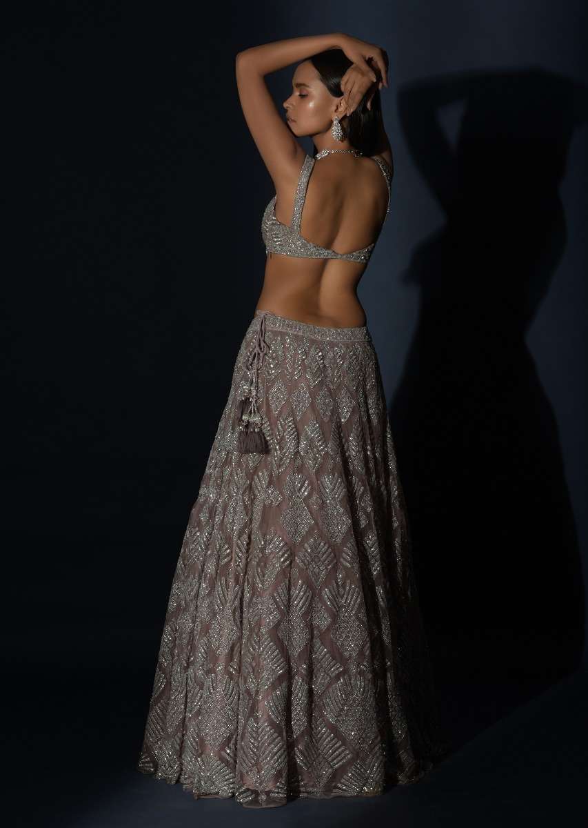 Taupe Grey Lehenga Choli In Net Elaborately Hand Embellished With Cut Dana Work In Geometric Pattern