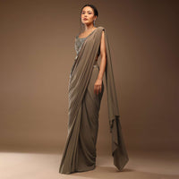 Taupe Grey Ready-Pleated Saree With A Crop Top In Foil Applique Embellishment Sleeveless With A Tie-Up Tassel Dori At The Back.