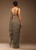 Taupe Grey Ready-Pleated Saree With A Crop Top In Foil Applique Embellishment Sleeveless With A Tie-Up Tassel Dori At The Back.