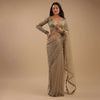 Tea Green Organza Saree With Self Buttis And A Floral Printed Satin Blouse