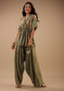 Tea Green Satin Peplum Top And Dhoti Pants With A Floral Print