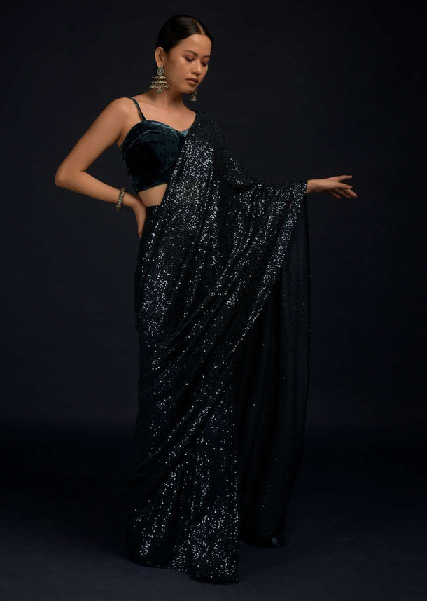 Teal Blue Ready Pleated Saree Embellished In Sequins With A Matching Velvet Blouse With Corset Neckline