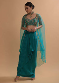 Teal Drape Skirt And Crop Top With Matching Cape And Colorful Resham Embroidered Spring Blooms