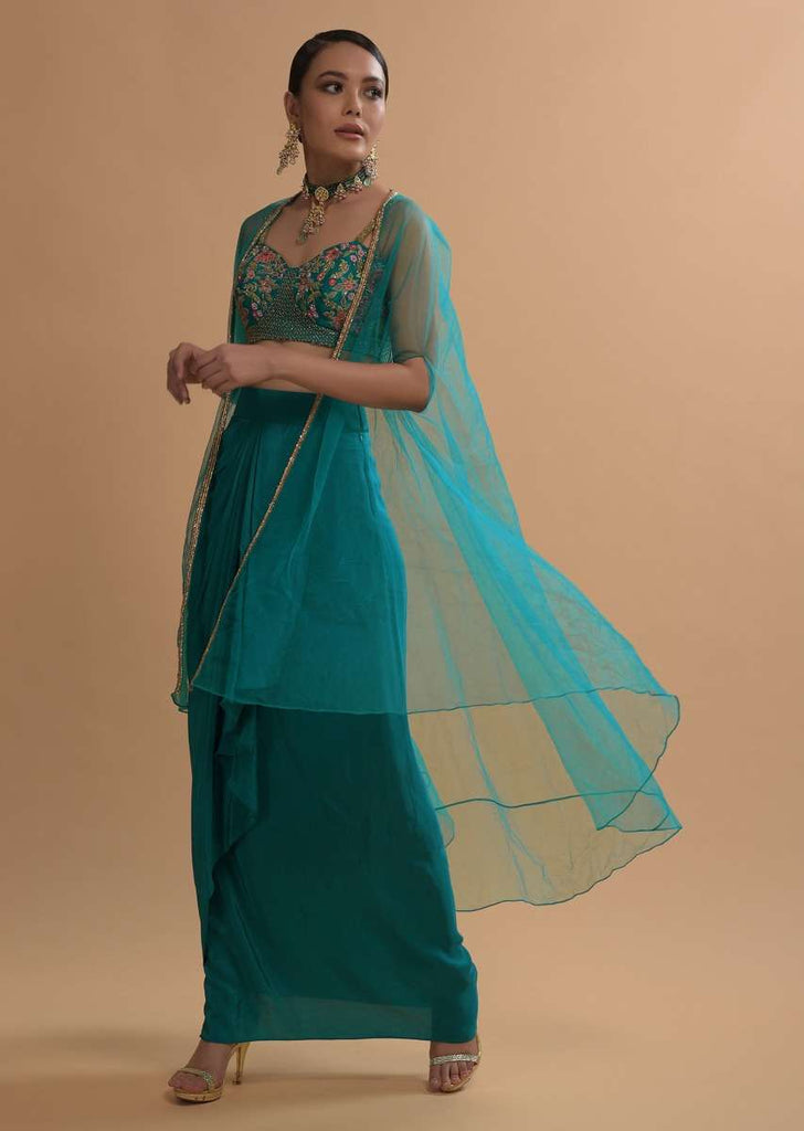 Teal Drape Skirt And Crop Top With Matching Cape And Colorful Resham Embroidered Spring Blooms