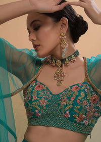 Teal Drape Skirt And Crop Top With Matching Cape And Colorful Resham Embroidered Spring Blooms