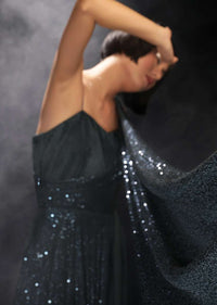 Teal Gown Embellished In Sequins With Drape Design On The Bodice And Extended Cape On One Shoulder