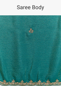 Teal Green Crushed Tissue Saree With Cutdana Embroidery And Scallop Border