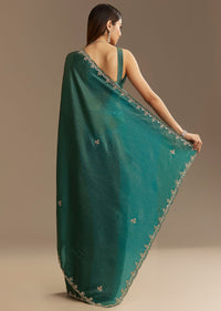 Teal Green Crushed Tissue Saree With Cutdana Embroidery And Scallop Border