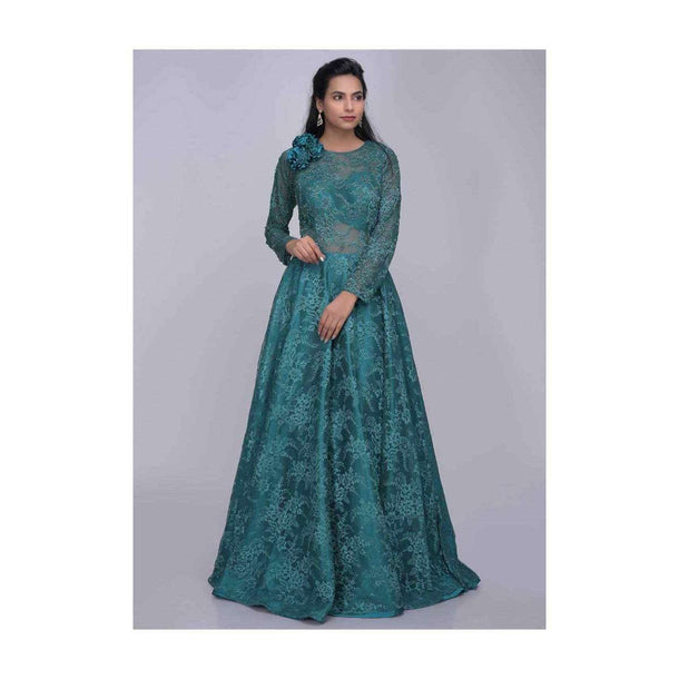 Teal green ethnic gown in fancy floral lace fabric only on Kalki