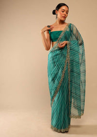 Teal Green Saree In Organza With Lehariya Print And Hand Embroidered Border With Beads And Sequins Work