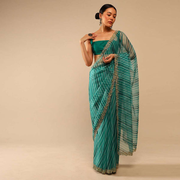 Teal Green Saree In Organza With Lehariya Print And Hand Embroidered Border With Beads And Sequins Work