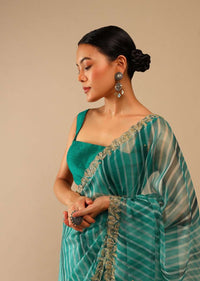 Teal Green Saree In Organza With Lehariya Print And Hand Embroidered Border With Beads And Sequins Work