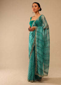 Teal Green Saree In Organza With Lehariya Print And Hand Embroidered Border With Beads And Sequins Work