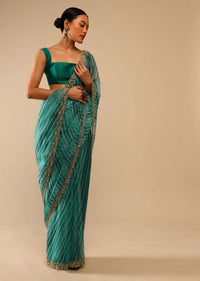 Teal Green Saree In Organza With Lehariya Print And Hand Embroidered Border With Beads And Sequins Work