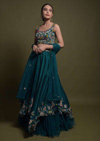 Teal Lehenga Choli In Cotton Silk With Fancy Cutout Hemline And Floral Embroidery