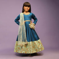 Kalki Girls Teal blue Anarkali gown with green border and intricate lace embroidery by fayon kids