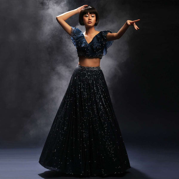 Teal Lehenga Embellished In Sequins Paired With A Ruffled Crop Top Adorned In Cut Dana And Moti Work
