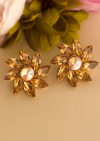 Topaz Studs In Floral Motif Online - Kalki Fashion