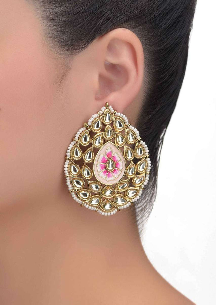 Traditional leaf shaped earrings with kundan, pearls and mina work only on Kalki