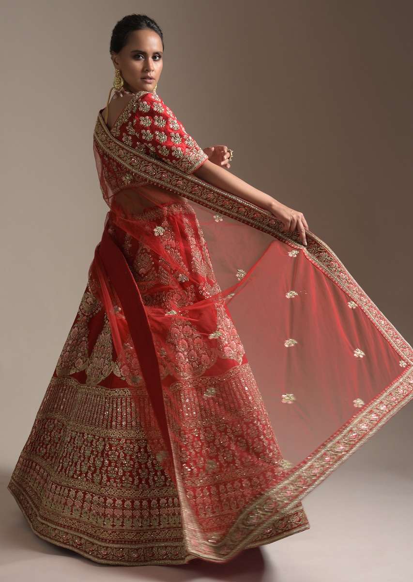 Turkey Red Lehenga Choli With Floral Motifs On The Kali And Hemline