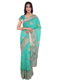 Turq banarasi silk saree with matching blouse piece only on Kalki