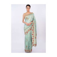 Turq blue banarasi brocade saree in checks and floral motif only on kalki