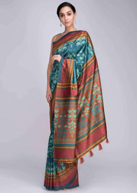 Turq blue silk saree in ikkat print and multi color striped only on Kalki