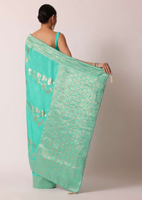 Turquoise Banarasi Saree With Floral Jaal Zari Pallu And Unstitched Blouse Piece