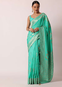 Turquoise Banarasi Saree With Floral Jaal Zari Pallu And Unstitched Blouse Piece